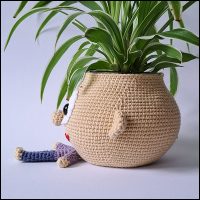 Product afbeelding plantenpop jongen zijkant Plantenpopje/brilhouder patroon