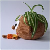 Product afbeelding plantenpop meisje zijkant Plantenpopje/brilhouder patroon