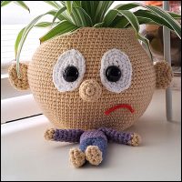 Product afbeelding plantenpopje jongen verdrietig Plantenpopje/brilhouder patroon