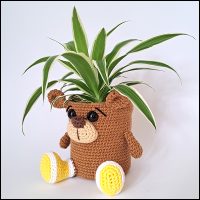 Product afbeelding plantenpotje beer bruin schuin Beer plantenpotje patroon