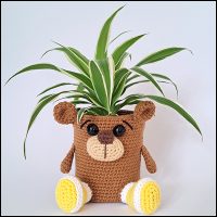 Product afbeelding plantenpotje beer bruin voorkant Beer plantenpotje patroon